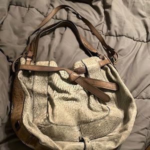Kona bag. Shoulder strap and cross body